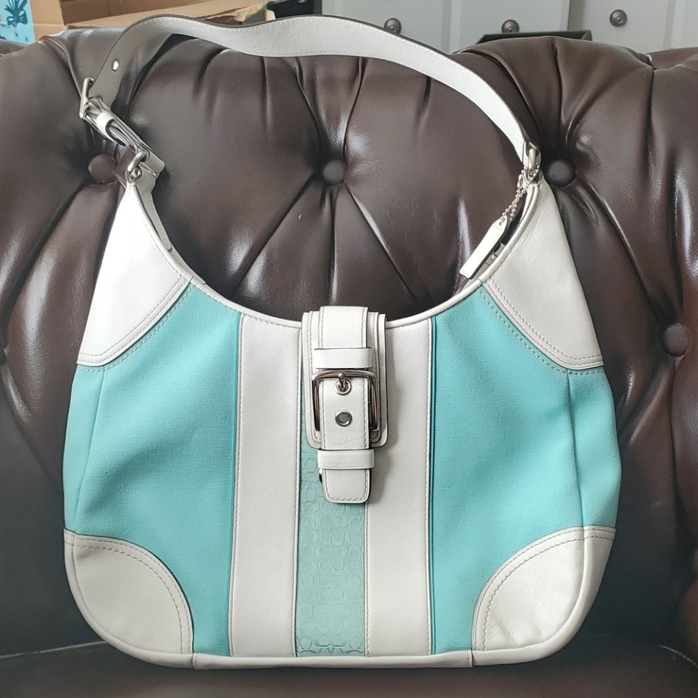 Turquoise and white Coach shoulder bag